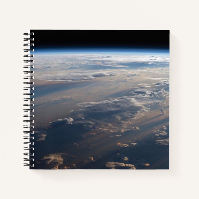 Sunrise Casts Long Shadows Over Philippine Sea Notebook (Front)