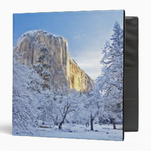 Sunrise light hits El Capitan through snowy Binder
