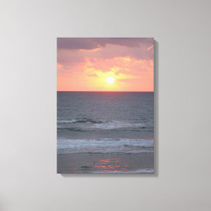 Sunrise on the beach Wrapped Canvas