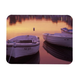 Sunrise over Stari Grad harbour with fishing Magnet