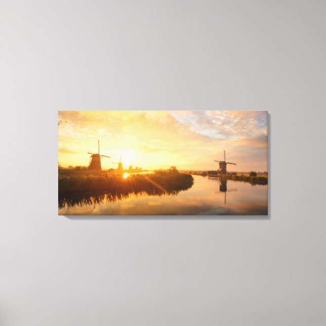 Sunrise over windmills and a river in Holland Canvas Print (Front)