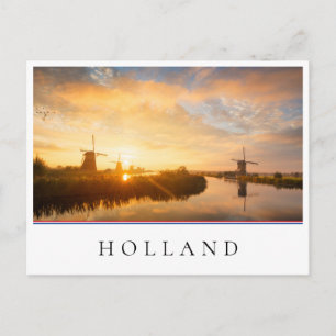 Sunrise over windmills and a river in Holland Postcard