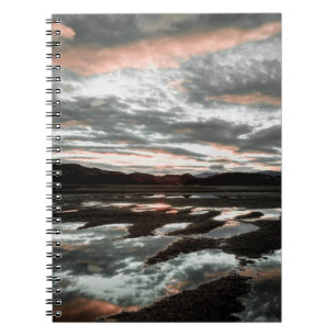 Sunrise reflections at Lago Grey. Torres del Notebook