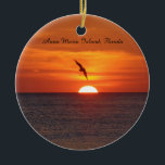 Sunset Beach ornament<br><div class="desc">Awesome picture of a Pelican flying in view of sunset.  Take on the beach in Anna Maria Island,  Florida</div>