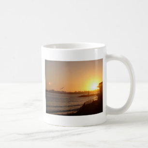 Sunset by the lighthouse coffee mug