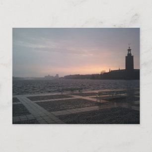 Sunset in rain over Stockholm City Hall Postcard