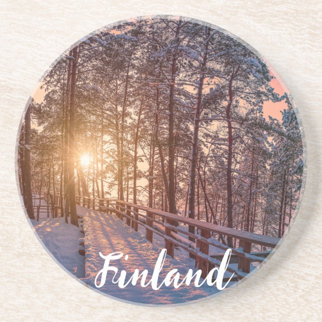 Sunset in snowy pine forest with sun ray coaster (Front)