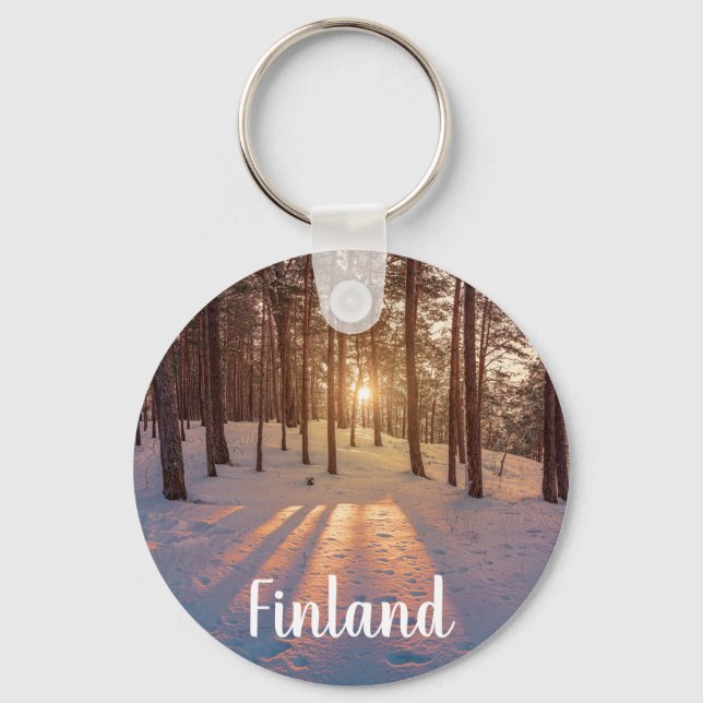 Sunset in snowy winter pine forest keychain (Front)