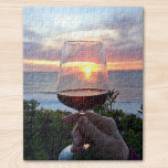Sunset Jigsaw Puzzle<br><div class="desc">Say Cheers to the sunset and your friends!
This jigsaw puzzle features a sunset on the French coast seen through a glass of red wine. Santé</div>