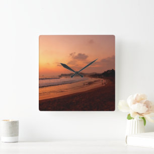 Sunset on a beach in Mexico Square Wall Clock
