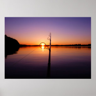 Sunset on a summer lake seen through a fishing rod poster