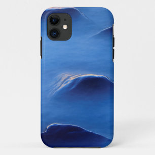 Sunset on rocks protruding through foamy water iPhone 11 case