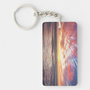 Sunset over beach and sea keychain