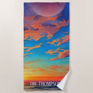 Sunset over beautiful clear blue ocean water beach towel