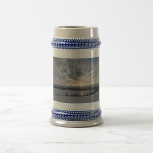 Sunset over frozen lake beer stein