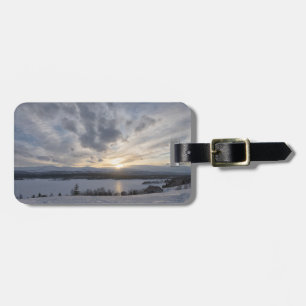 Sunset over frozen lake luggage tag