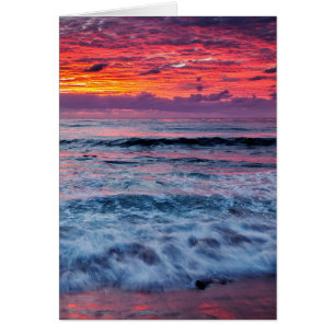 Sunset over ocean waves, California