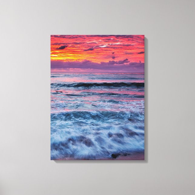 Sunset over ocean waves, California Canvas Print (Front)