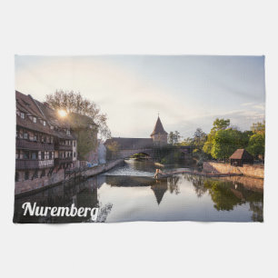 Sunset over old medieval bridge in Nuremberg Kitchen Towel