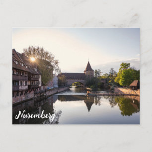 Sunset over old medieval bridge in Nuremberg Postcard