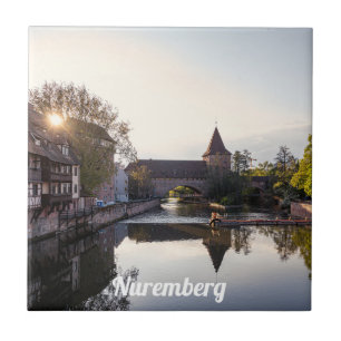 Sunset over old medieval bridge in Nuremberg Tile