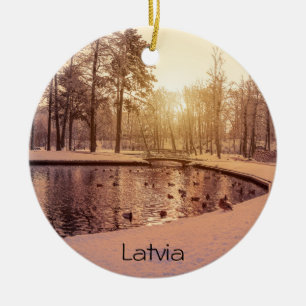Sunset over park with small frosty lake ceramic ornament