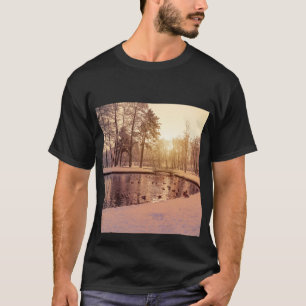 Sunset over park with small frosty lake T-Shirt
