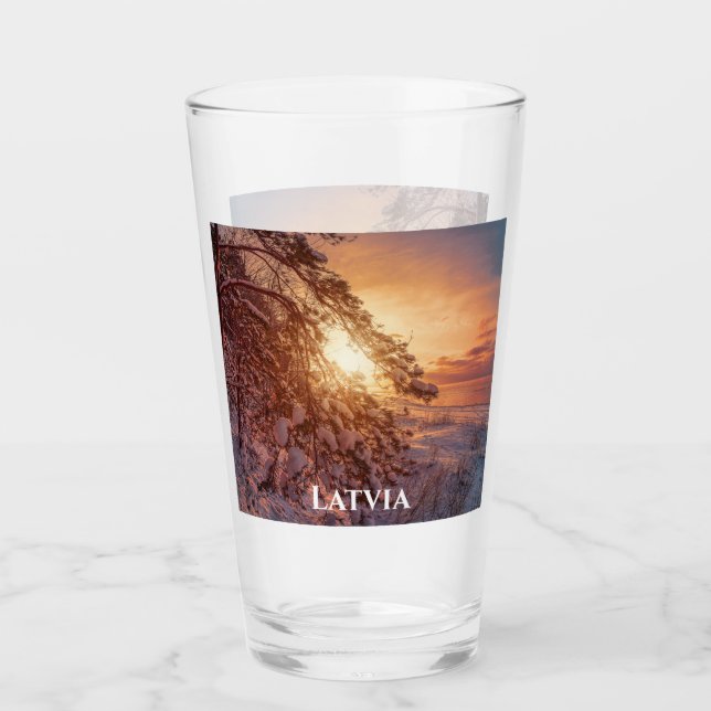 Sunset over sea and snowy pine tree glass (Front)