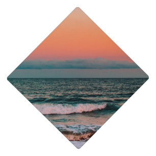 sunset over sea graduation cap topper