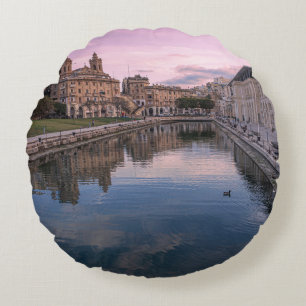 Sunset over small canal in Cospicua, Malta Round Pillow