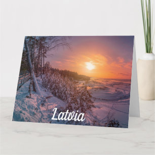 Sunset over snow sea coast card