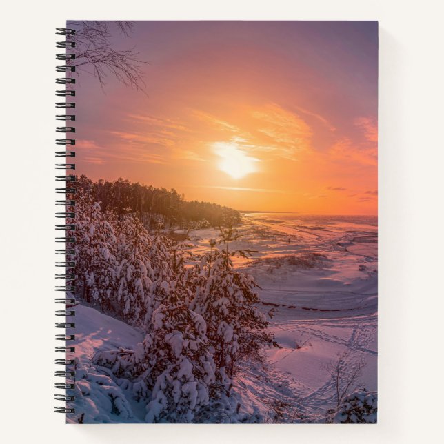 Sunset over snow sea coast notebook (Front)