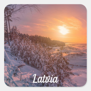 Sunset over snow sea coast square sticker