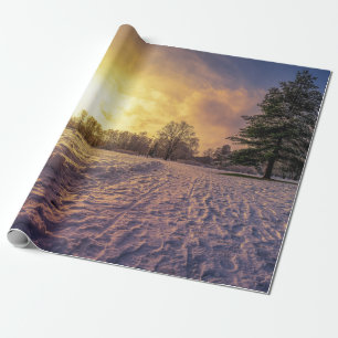 Sunset over snowy winter park wrapping paper