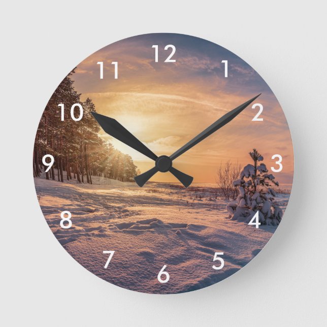 Sunset over snowy winter sea coast round clock (Front)