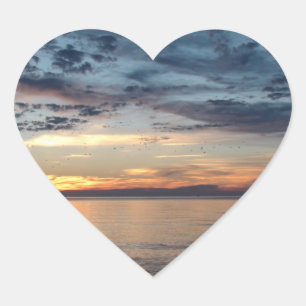 Sunset over the beach and ocean Photo Sticker