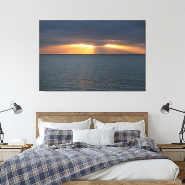 Sunset over the ocean breaking through the clouds canvas print (Insitu(Bedroom))
