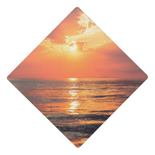 sunset over water graduation cap topper