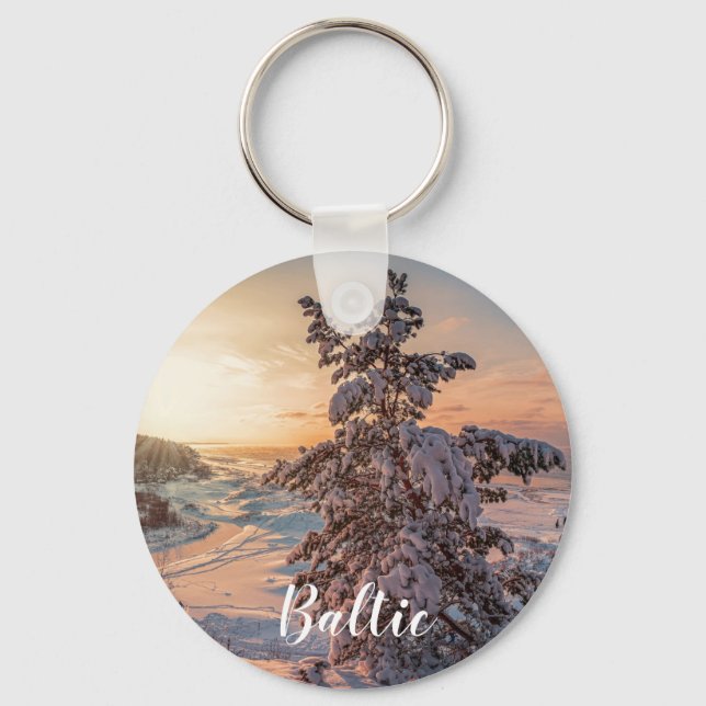 Sunset over winter snowy sea coast keychain (Front)