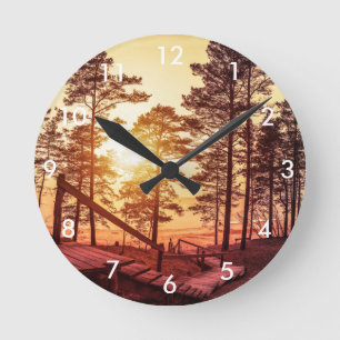 Sunset over wooden path in pine Acrylic Wall Clock