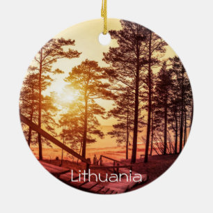 Sunset over wooden path in pine forest ceramic ornament