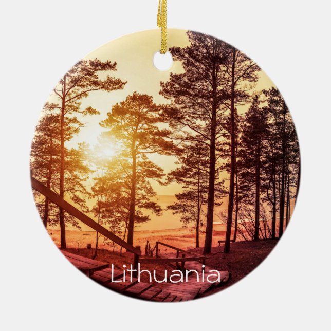 Sunset over wooden path in pine forest ceramic ornament (Back)