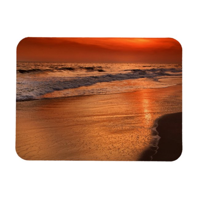 Sunset reflections off clouds and ocean shore magnet (Horizontal)