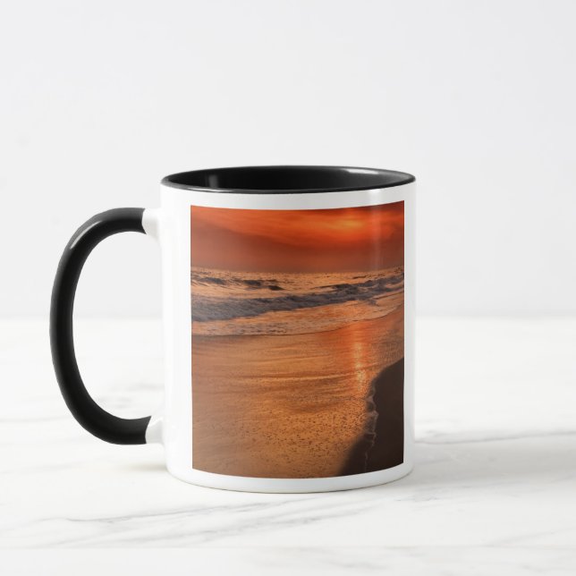Sunset reflections off clouds and ocean shore mug (Left)