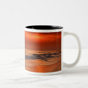 Sunset reflections off clouds and ocean shore Two-Tone coffee mug