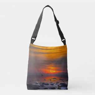 Sunset Reflections on a Rocky Shore Tote