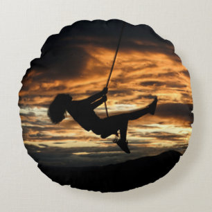 Sunset Silhouette of Girl on Swing Round Pillow