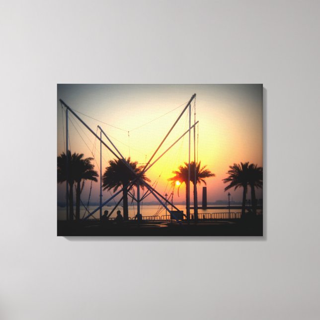 Sunset with palm trees and trampoline canvas print (Front)