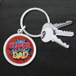 Super Dad Moustache Modern Grunge Keychain<br><div class="desc">Super Dad Moustache Modern Grunge Keychain features the text "Super Dad" in modern red and yellow typography on a blue and red grunge background accented with a moustache. Gifts for Dad for birthday,  Father's Day,  Christmas,  holidays and more. Created by Evco Studio www.zazzle.com/store/evcostudio</div>