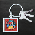 Super Dad Moustache Modern Grunge Keychain<br><div class="desc">Super Dad Moustache Modern Grunge Keychains features the text "Super Dad" in modern red and yellow typography on a blue and red grunge background accented with a moustache. Gifts for Dad for birthday,  Father's Day,  Christmas,  holidays and more. Created by Evco Studio www.zazzle.com/store/evcostudio</div>